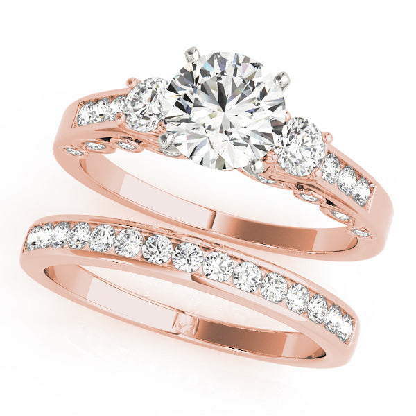 Round Three-Stone Diamond Engagement Ring · 0.44 ct tw
