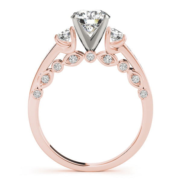 Round Three-Stone Diamond Engagement Ring · 0.44 ct tw