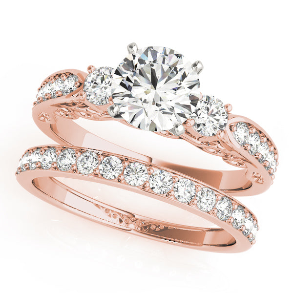 Round Three-Stone Diamond Engagement Ring · 0.46 ct tw
