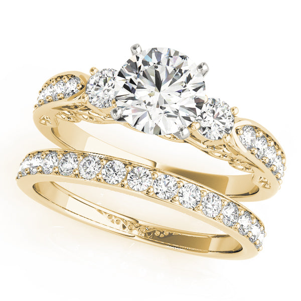 Round Three-Stone Diamond Engagement Ring · 0.46 ct tw