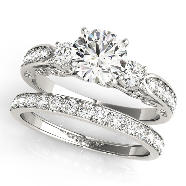 Round Three-Stone Diamond Engagement Ring · 0.46 ct tw