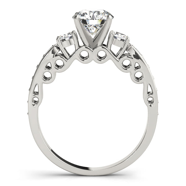 Round Three-Stone Diamond Engagement Ring · 0.46 ct tw