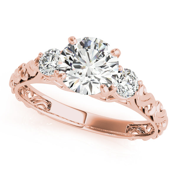 Round Three-Stone Diamond Engagement Ring · 0.24 ct tw