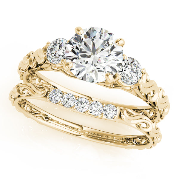 Round Three-Stone Diamond Engagement Ring · 0.24 ct tw