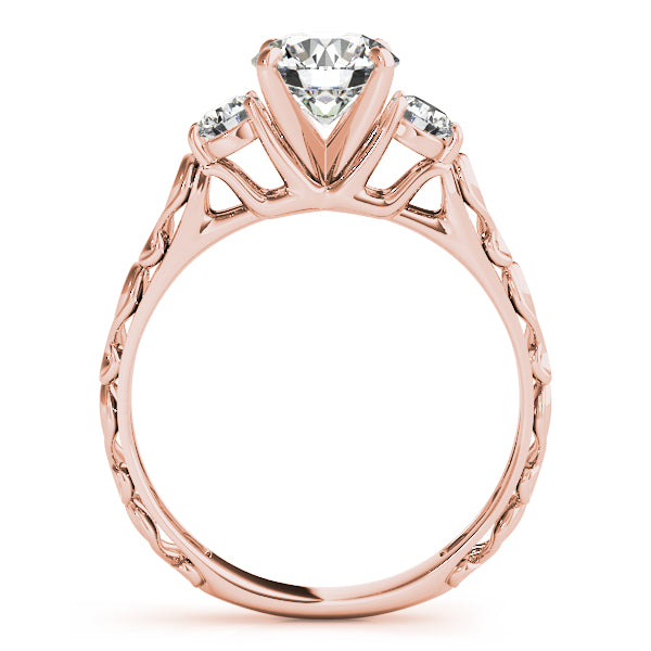 Round Three-Stone Diamond Engagement Ring · 0.24 ct tw