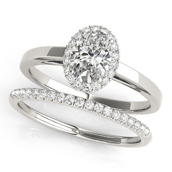 Oval Halo Diamond Engagement Ring · 0.18 ct tw