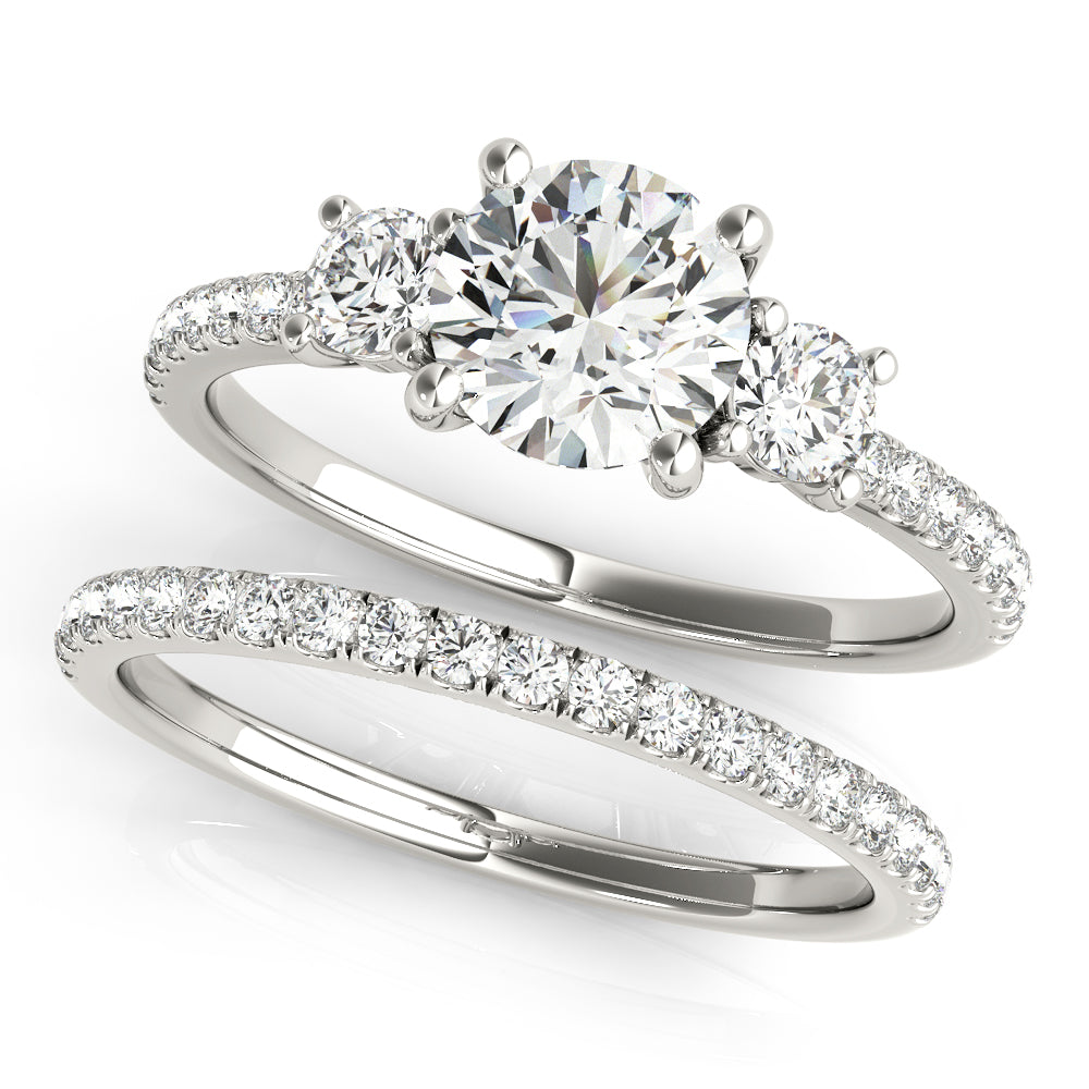 Round Three-Stone Diamond Engagement Ring · 0.40 ct tw