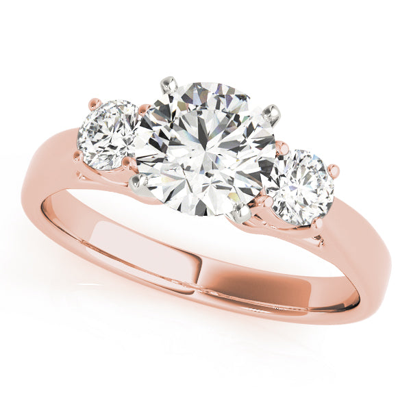 Round Three-Stone Diamond Engagement Ring · 0.70 ct tw