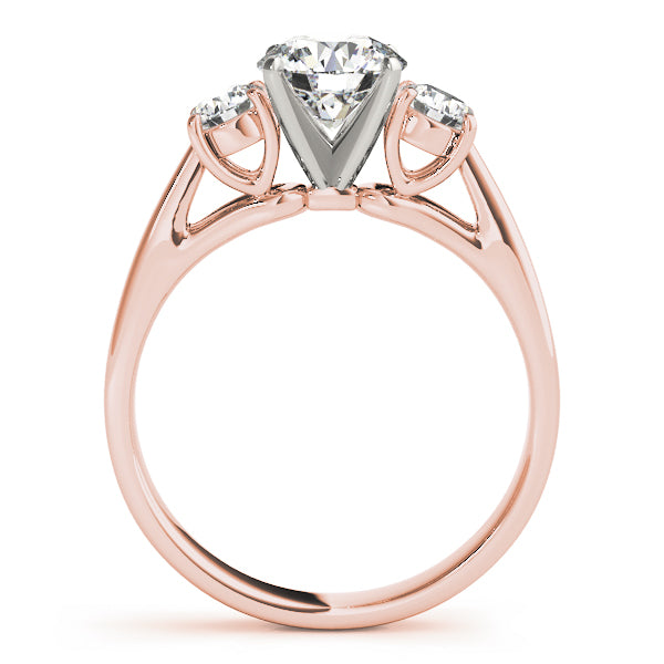 Round Three-Stone Diamond Engagement Ring · 0.70 ct tw