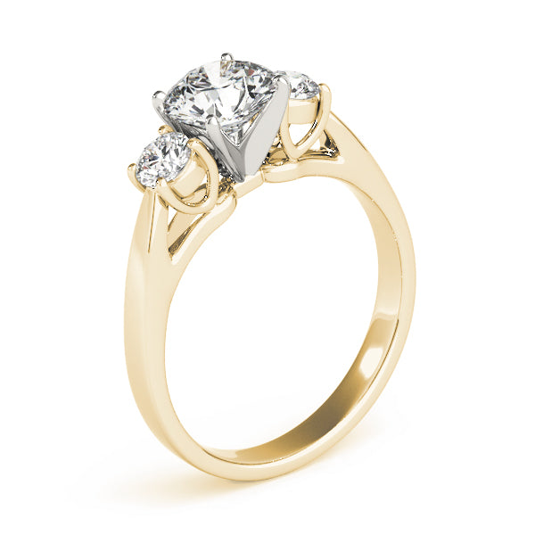 Round Three-Stone Diamond Engagement Ring · 0.70 ct tw