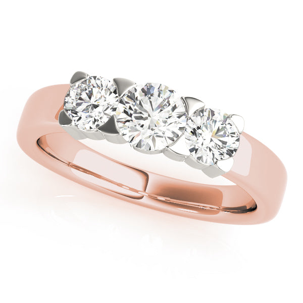 Round Three-Stone Diamond Engagement Ring · 0.49 ct tw