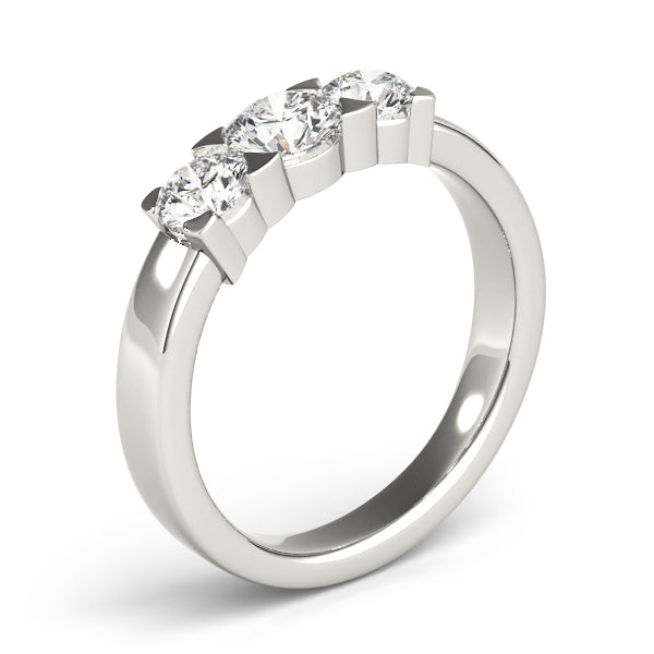 Round Three-Stone Diamond Engagement Ring · 0.49 ct tw