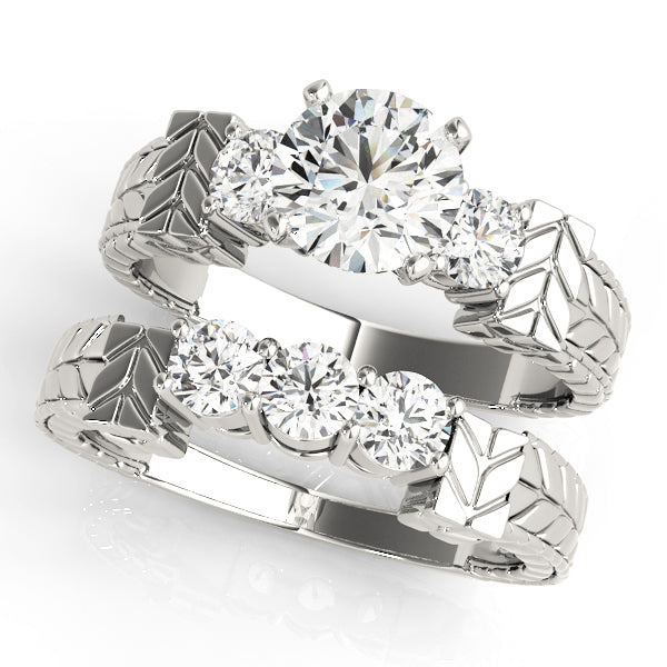 Round Three-Stone Diamond Engagement Ring · 0.30 ct tw