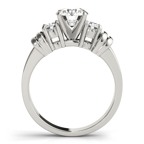Round Three-Stone Diamond Engagement Ring · 0.24 ct tw