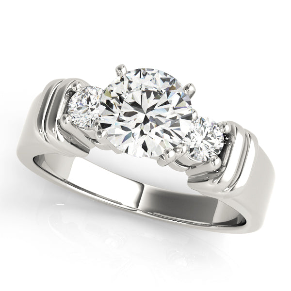 Round Three-Stone Diamond Engagement Ring · 0.24 ct tw