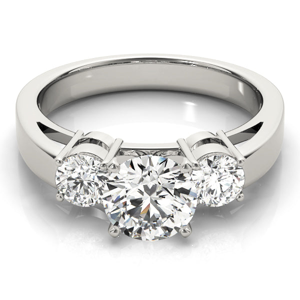 Round Three-Stone Diamond Engagement Ring · 0.25 ct tw