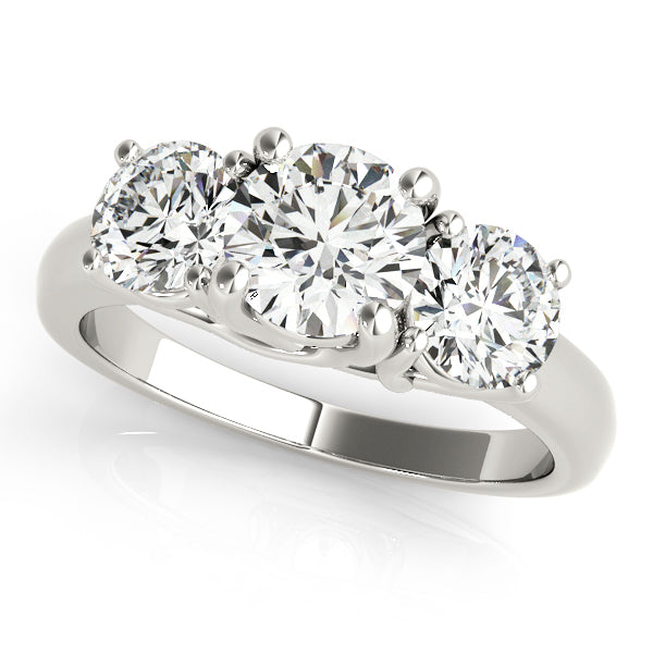 Round Three-Stone Diamond Engagement Ring · 0.24 ct tw