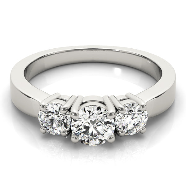 Round Three-Stone Diamond Engagement Ring · 0.49 ct tw