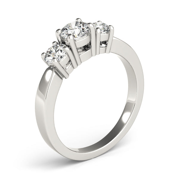 Round Three-Stone Diamond Engagement Ring · 0.73 ct tw
