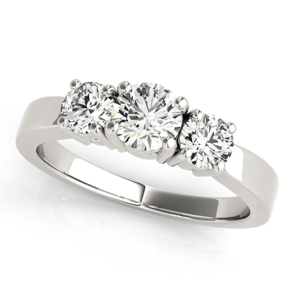 Round Three-Stone Diamond Engagement Ring · 0.73 ct tw