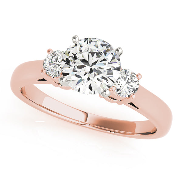 Round Three-Stone Diamond Engagement Ring · 0.24 ct tw