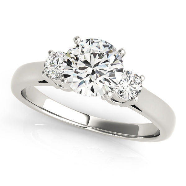 Round Three-Stone Diamond Engagement Ring · 0.14 ct tw