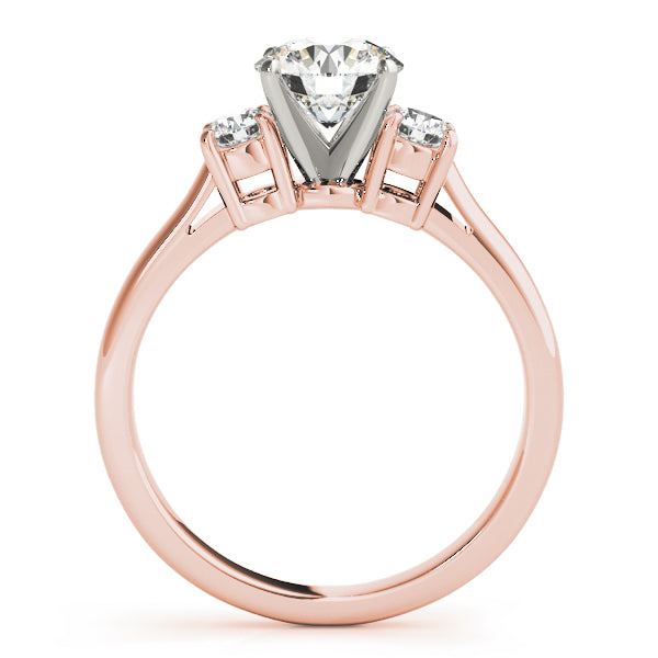 Round Three-Stone Diamond Engagement Ring · 0.24 ct tw