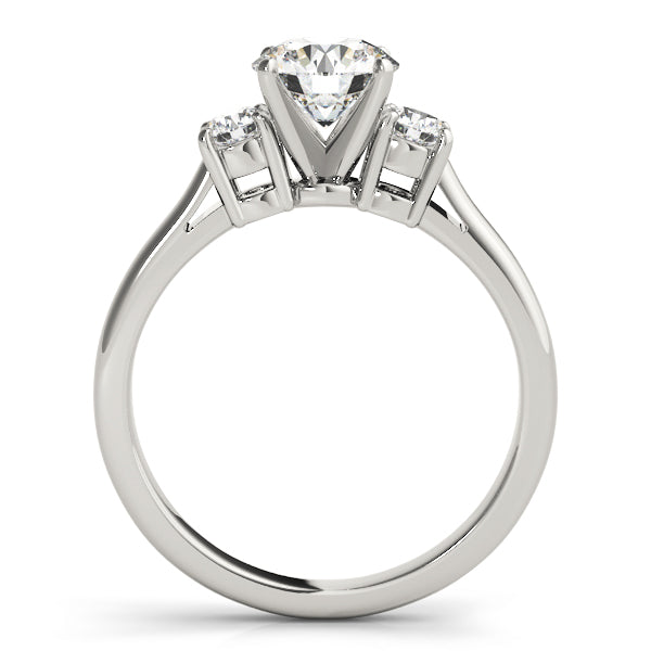 Round Three-Stone Diamond Engagement Ring · 0.14 ct tw