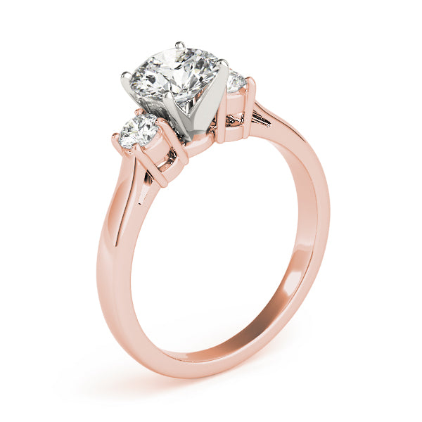 Round Three-Stone Diamond Engagement Ring · 0.14 ct tw