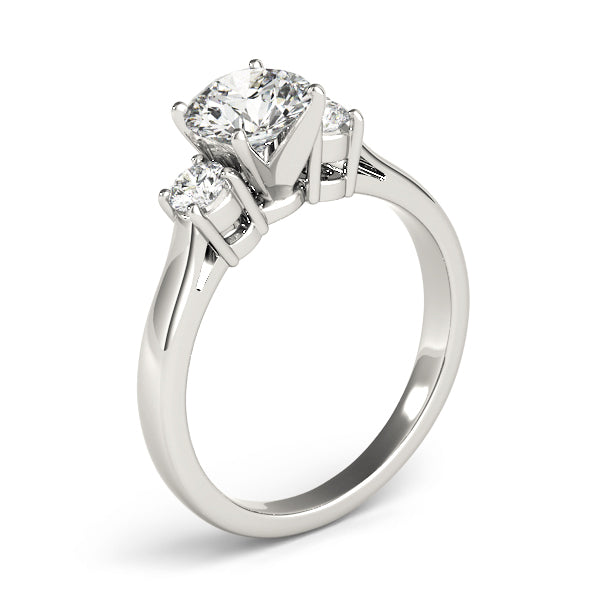 Round Three-Stone Diamond Engagement Ring · 0.14 ct tw