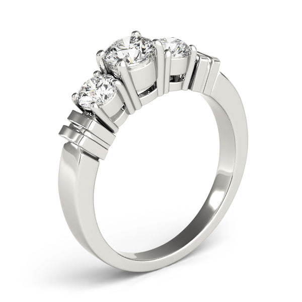 Round Three-Stone Diamond Engagement Ring · 0.24 ct tw