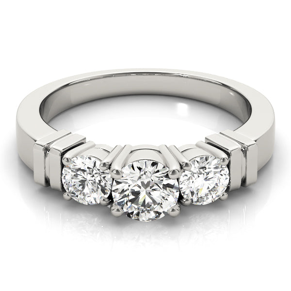 Round Three-Stone Diamond Engagement Ring · 0.24 ct tw