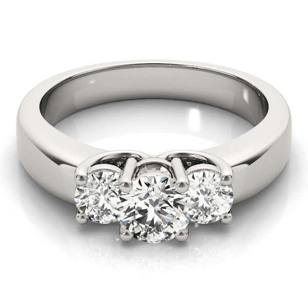 Round Three-Stone Diamond Engagement Ring · 0.24 ct tw
