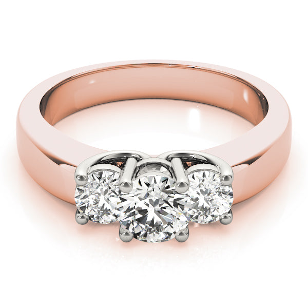 Round Three-Stone Diamond Engagement Ring · 0.24 ct tw