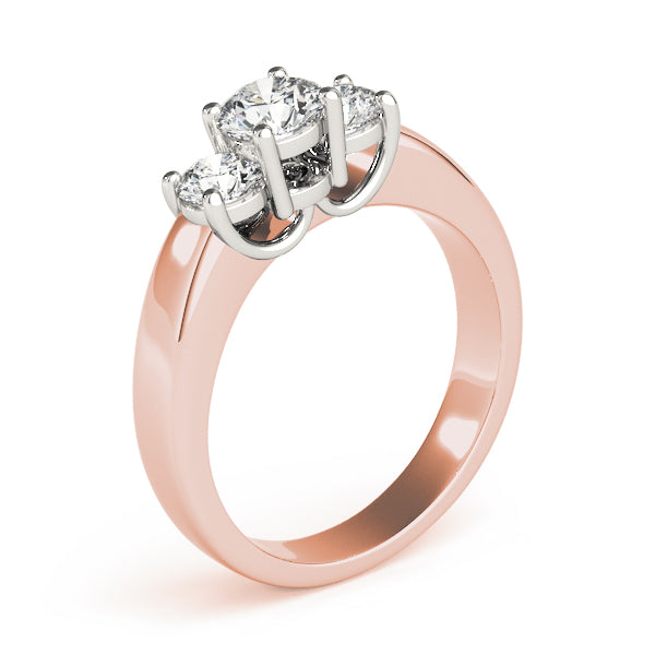 Round Three-Stone Diamond Engagement Ring · 0.49 ct tw