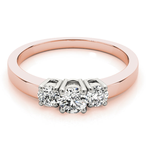Round Three-Stone Diamond Engagement Ring · 0.24 ct tw