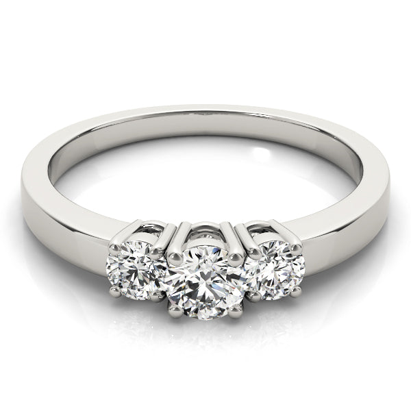 Round Three-Stone Diamond Engagement Ring · 0.24 ct tw