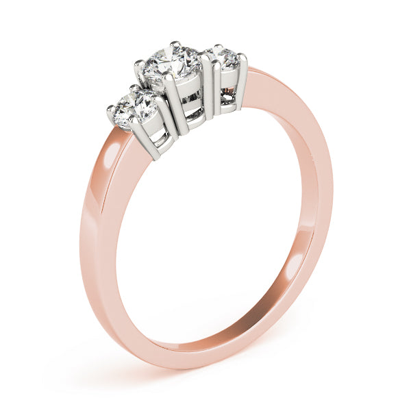 Round Three-Stone Diamond Engagement Ring · 0.08 ct tw