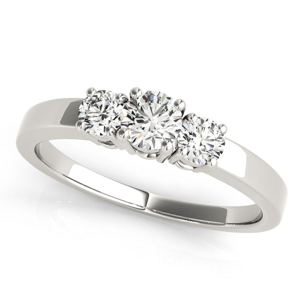 Round Three-Stone Diamond Engagement Ring · 0.08 ct tw