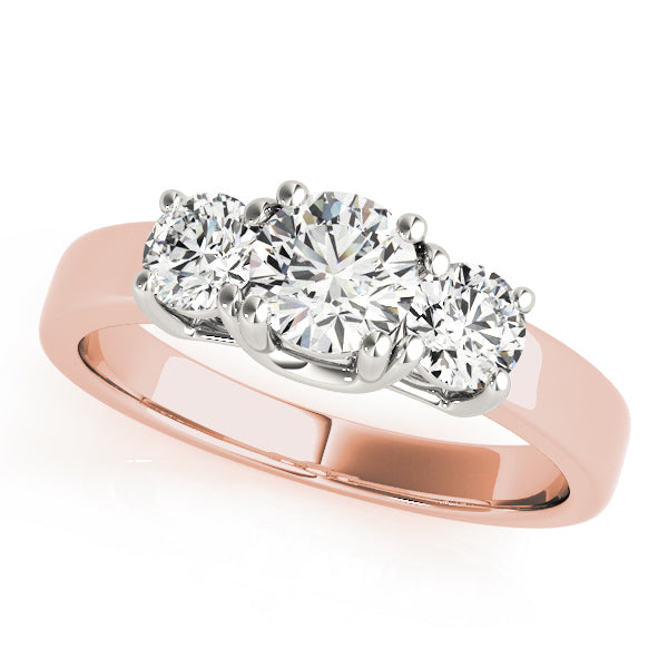 Round Three-Stone Diamond Engagement Ring · 0.47 ct tw