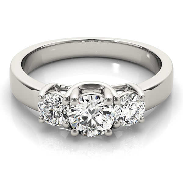 Round Three-Stone Diamond Engagement Ring · 0.47 ct tw