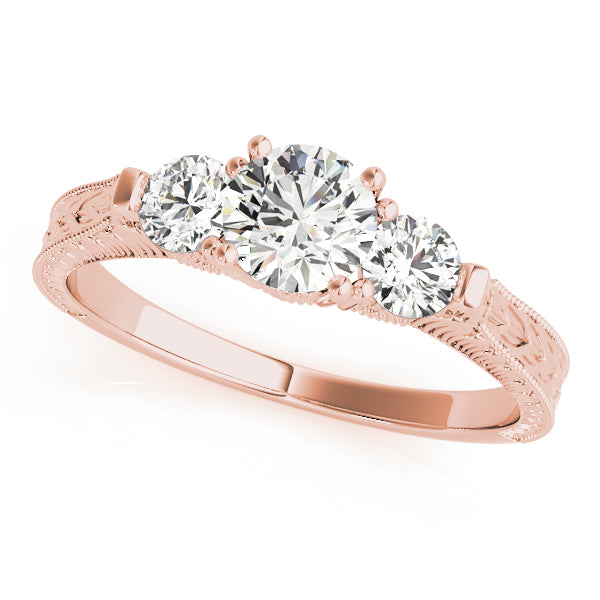 Round Three-Stone Diamond Engagement Ring · 1.33 ct tw