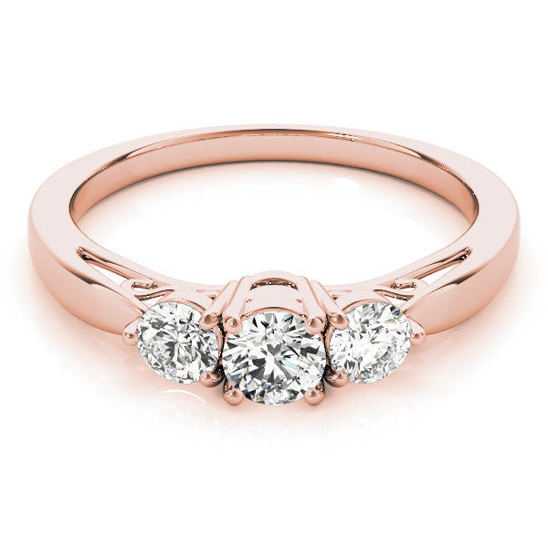 Round Three-Stone Diamond Engagement Ring · 0.74 ct tw