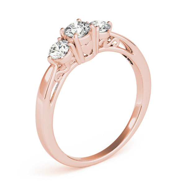 Round Three-Stone Diamond Engagement Ring · 0.74 ct tw