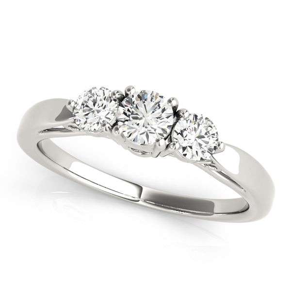 Round Three-Stone Diamond Engagement Ring · 0.74 ct tw
