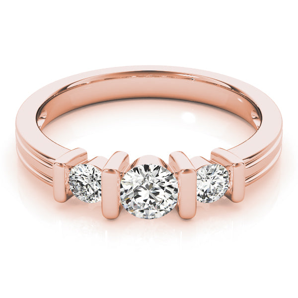 Round Three-Stone Diamond Engagement Ring · 0.74 ct tw