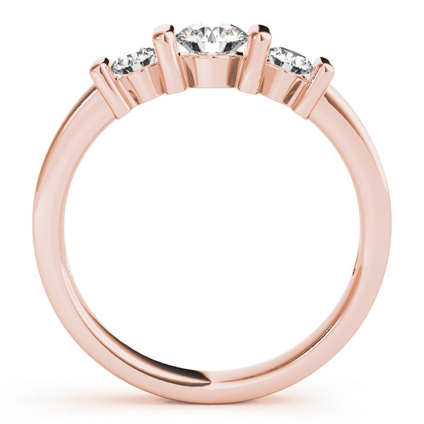 Round Three-Stone Diamond Engagement Ring · 0.74 ct tw