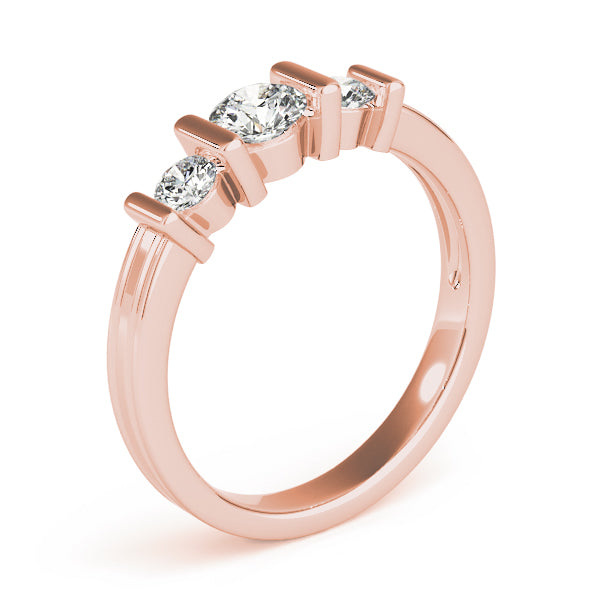 Round Three-Stone Diamond Engagement Ring · 0.53 ct tw