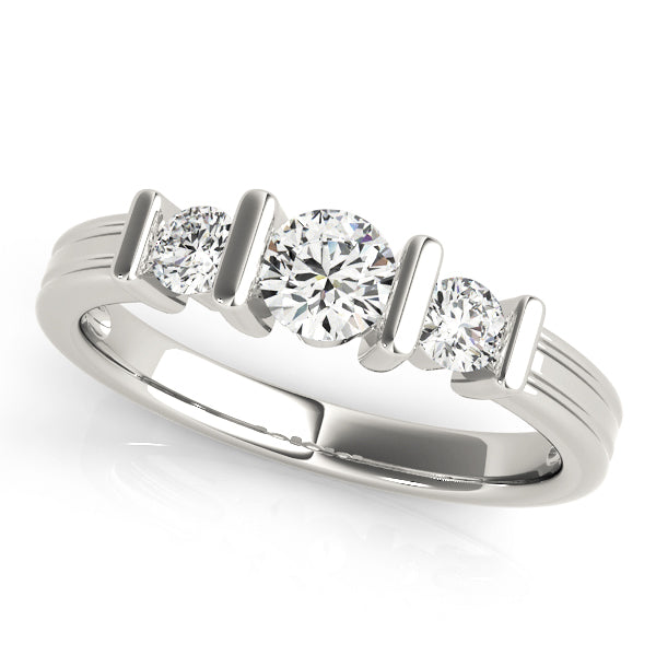 Round Three-Stone Diamond Engagement Ring · 0.53 ct tw