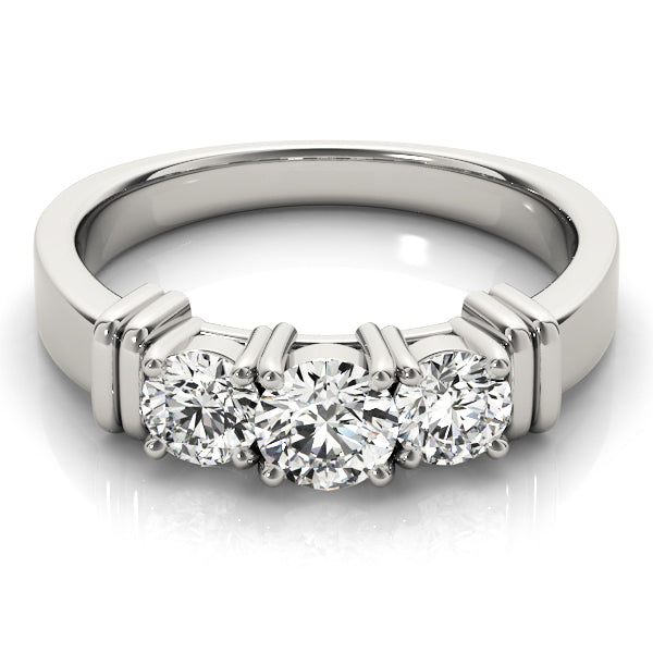 Round Three-Stone Diamond Engagement Ring · 0.24 ct tw